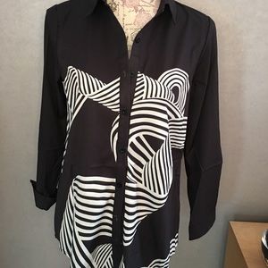 Shirt with black and white design.